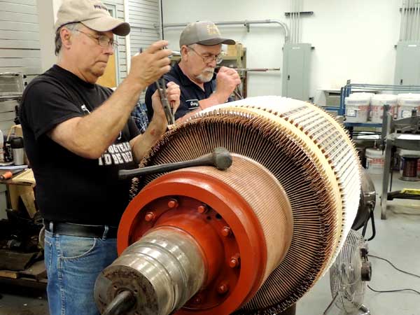 Illiana Technicians Rewinding Spindle